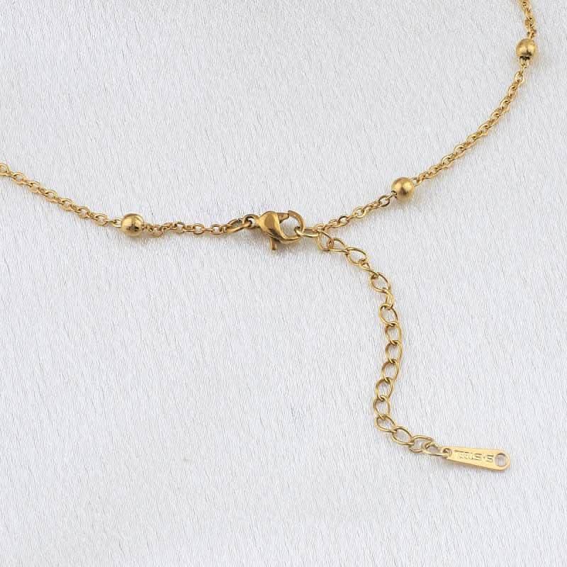 Collana con gocciolina con iniziale e pietra portafortuna