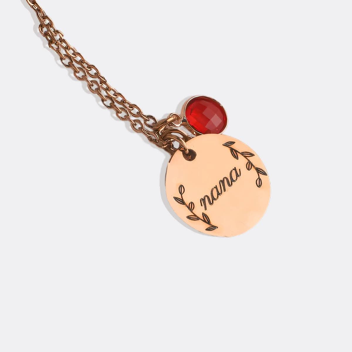 Collana con pendente in pietra portafortuna incisa con foglie