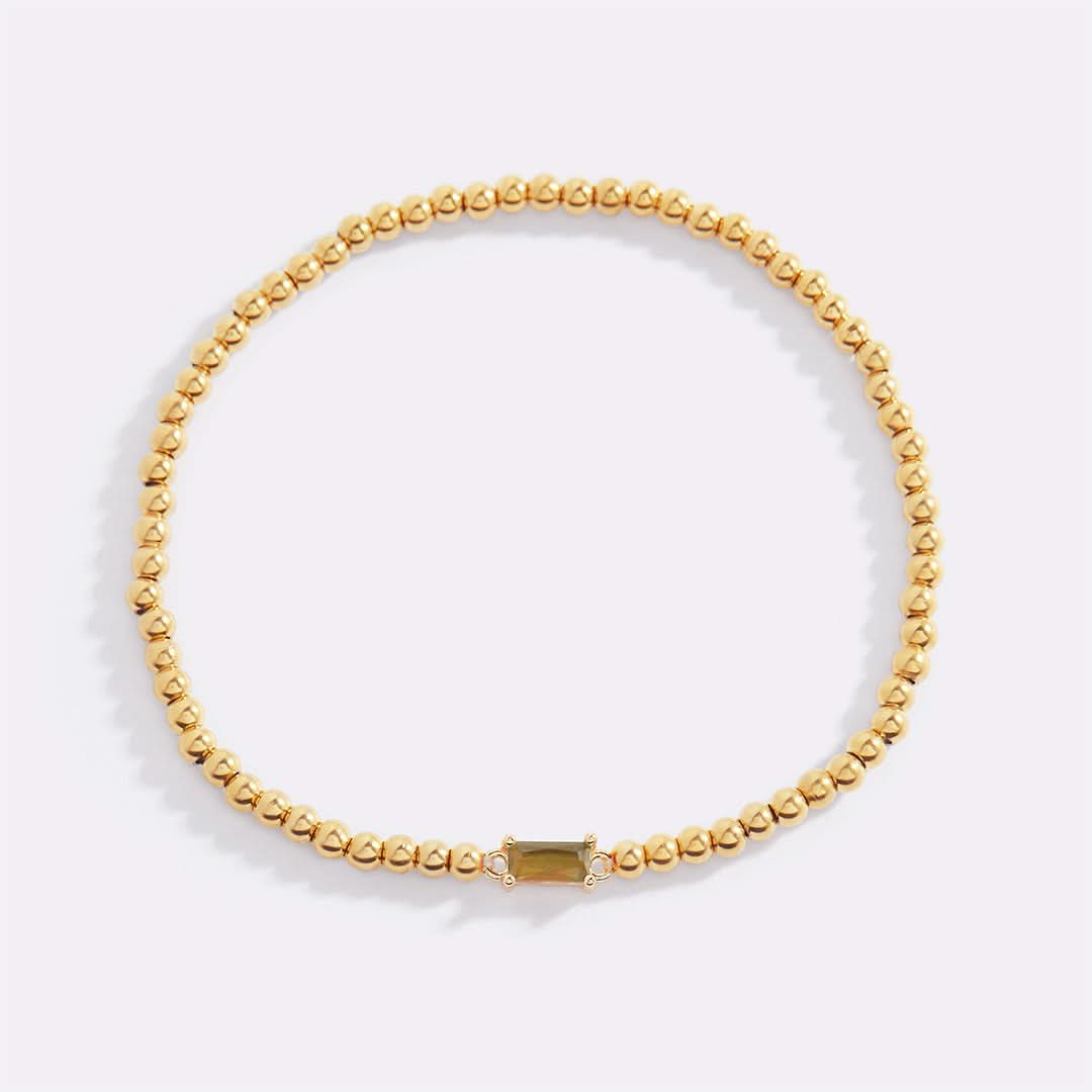 Bracciale con pietre di nascita in oro