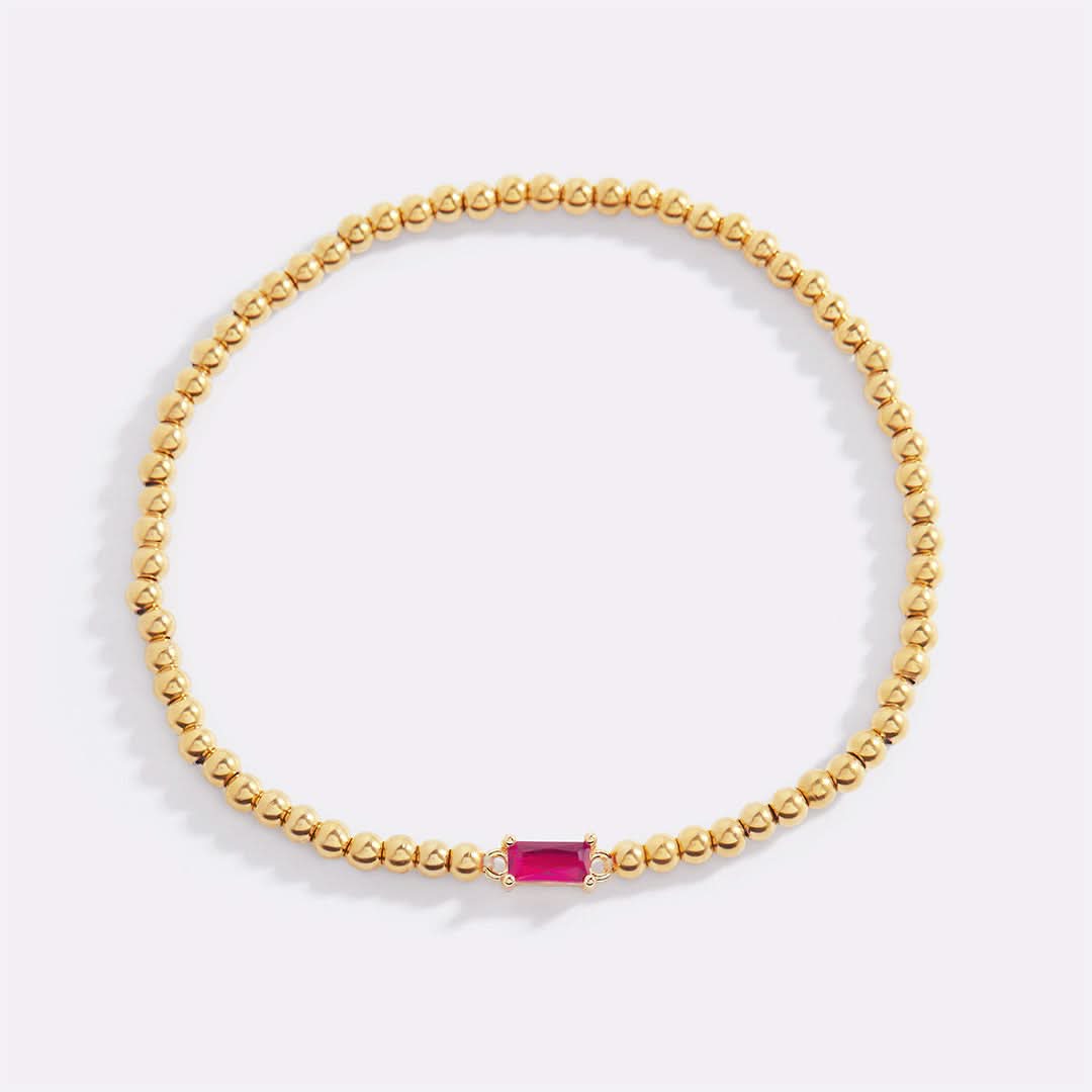 Bracciale con pietre di nascita in oro