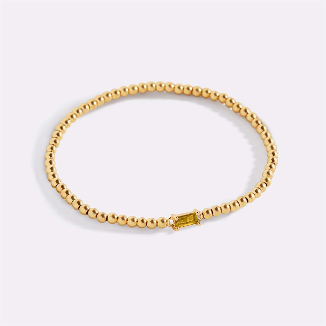 Bracciale con pietre di nascita in oro