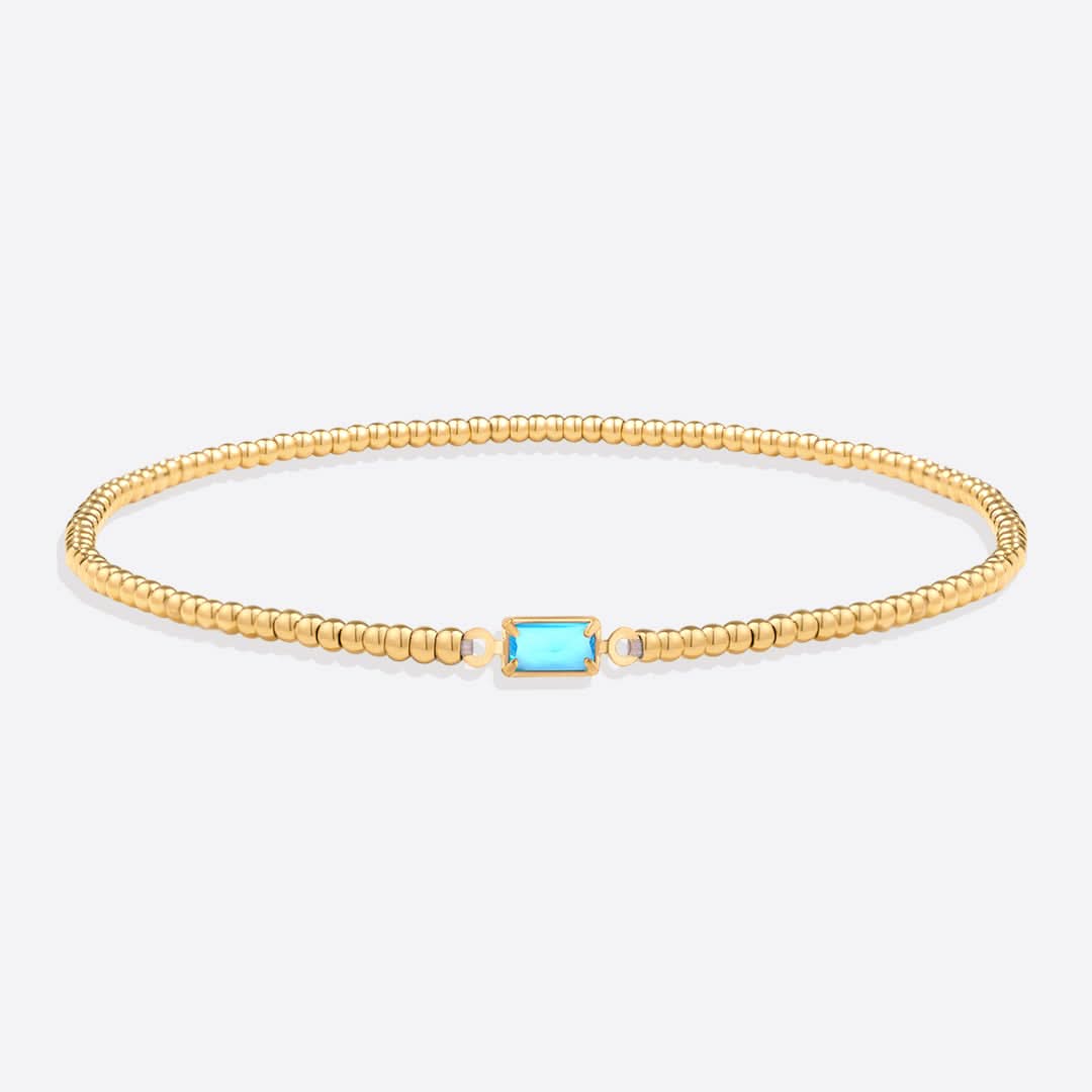 Bracciale con pietre di nascita in oro